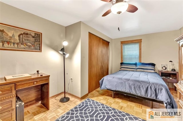 71 Russell St, Woodbridge Proper, NJ 07095 - bedroom with a closet, baseboards, a ceiling fan, and an office area