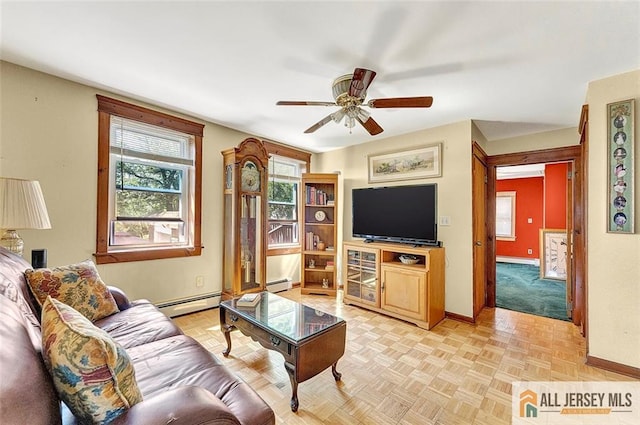 71 Russell St, Woodbridge Proper, NJ 07095 - living area with baseboards, baseboard heating, and a ceiling fan