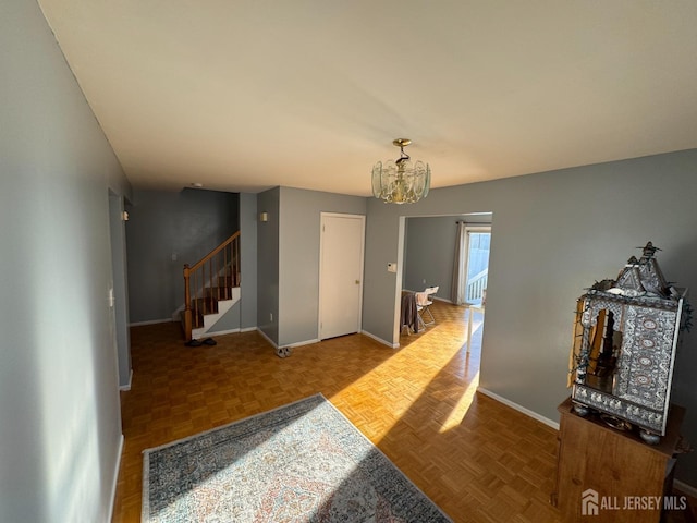 51 Tanbark Dr, Sayreville, NJ 08859 - hall with a chandelier and stairs