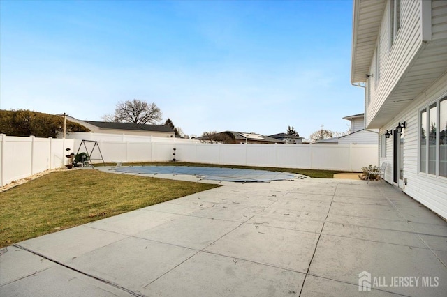 view of patio featuring a fenced backyard