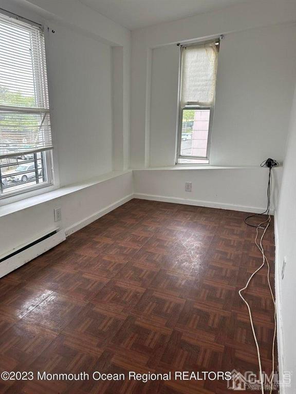 spare room with plenty of natural light