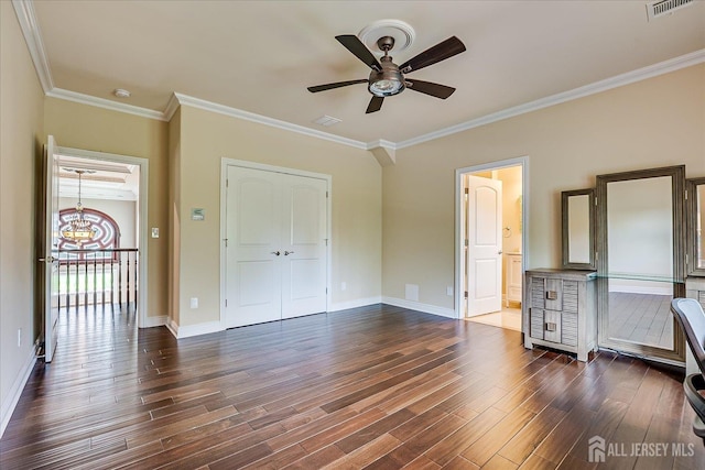 87 Ellmyer Rd, Edison, NJ 08820 - unfurnished bedroom with dark wood-style flooring, ornamental molding, a chandelier, a closet, and ceiling fan
