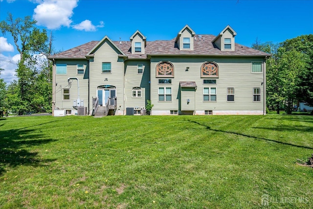 87 Ellmyer Rd, Edison, NJ 08820 - view of front of house featuring entry steps and a front lawn