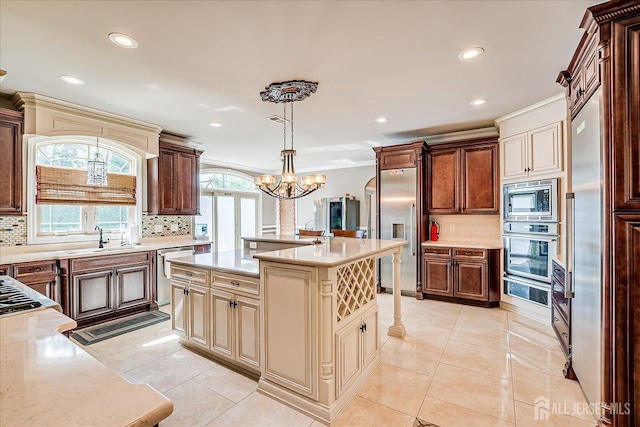 87 Ellmyer Rd, Edison, NJ 08820 - kitchen featuring built in appliances, backsplash, recessed lighting, a chandelier, and hanging light fixtures