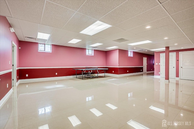87 Ellmyer Rd, Edison, NJ 08820 - empty room with tile patterned flooring and a paneled ceiling