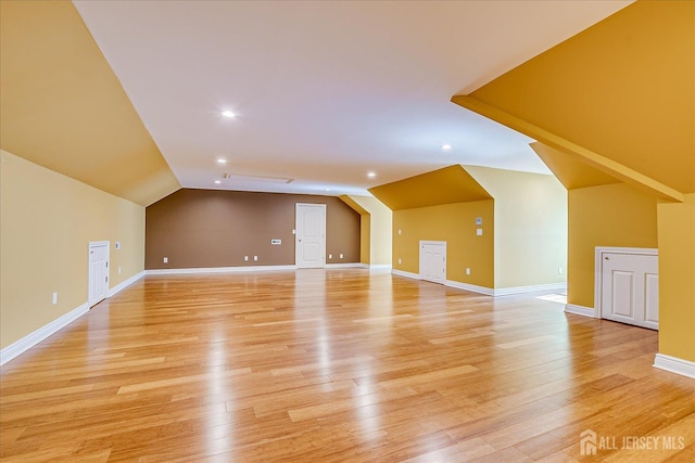 87 Ellmyer Rd, Edison, NJ 08820 - additional living space with vaulted ceiling, light wood finished floors, and recessed lighting