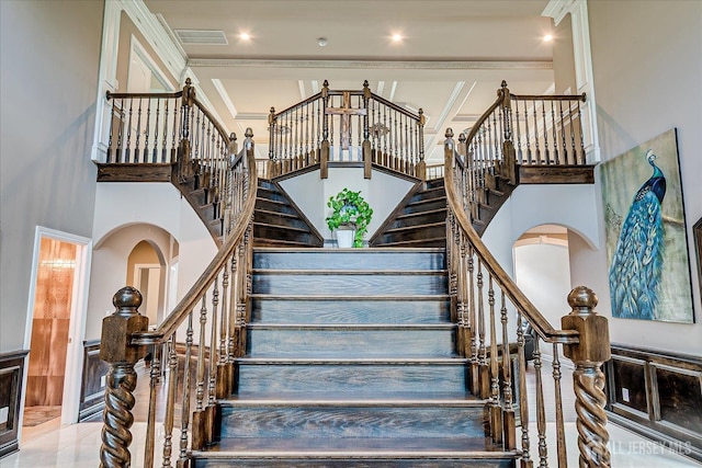 87 Ellmyer Rd, Edison, NJ 08820 - stairs featuring a high ceiling, arched walkways, and ornamental molding