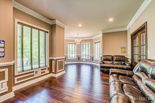 87 Ellmyer Rd, Edison, NJ 08820 - living room with a chandelier, dark wood-style flooring, wainscoting, ornamental molding, and recessed lighting