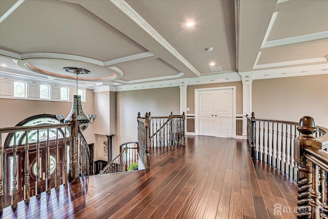 87 Ellmyer Rd, Edison, NJ 08820 - hallway featuring an upstairs landing, ornate columns, wood finished floors, and crown molding