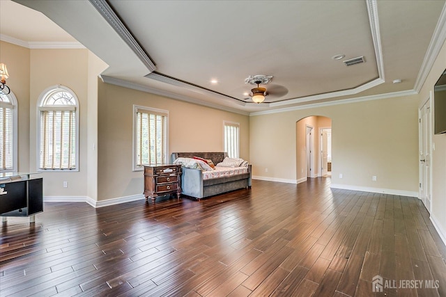 87 Ellmyer Rd, Edison, NJ 08820 - living area featuring arched walkways, a tray ceiling, healthy amount of natural light, dark wood-style floors, and crown molding
