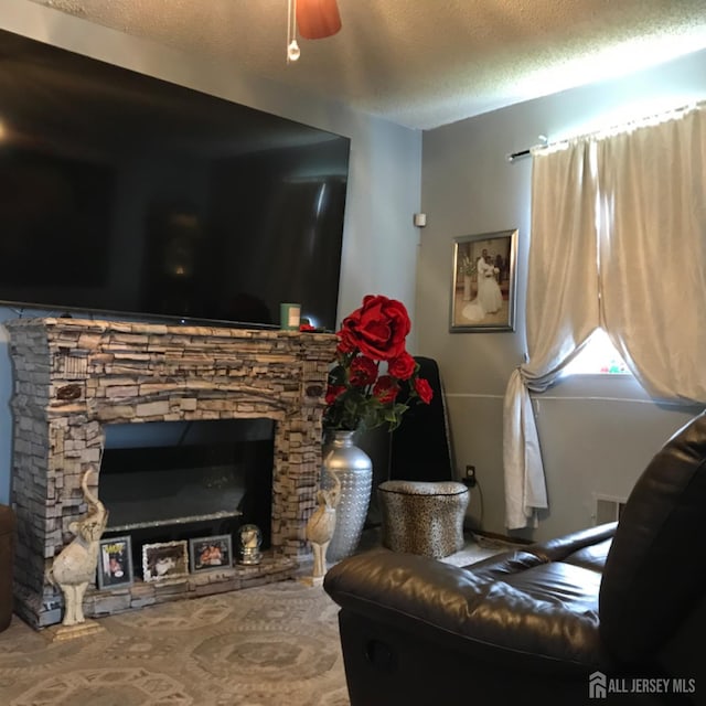335 Alpine St, Perth Amboy, NJ 08861 - living room with a textured ceiling and a stone fireplace
