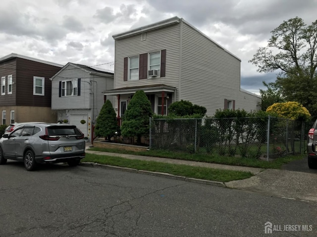 335 Alpine St, Perth Amboy, NJ 08861 - front facade with an attached garage and cooling unit