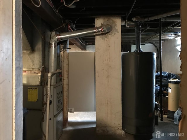 335 Alpine St, Perth Amboy, NJ 08861 - utility room featuring gas water heater