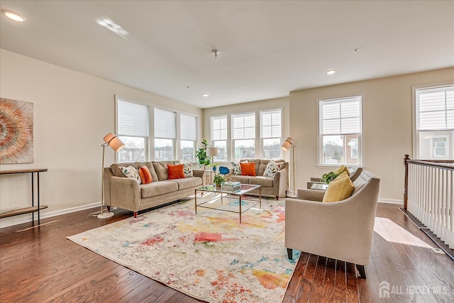 living room with dark hardwood / wood-style floors