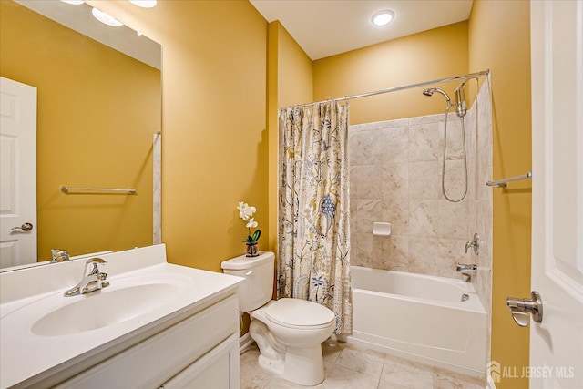 full bathroom featuring vanity, shower / bath combo, tile patterned floors, and toilet