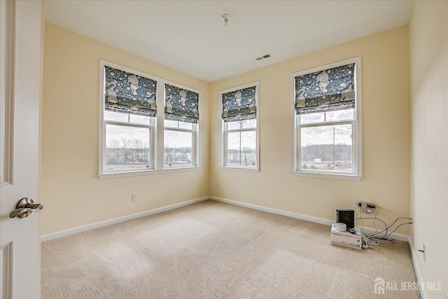 view of carpeted spare room