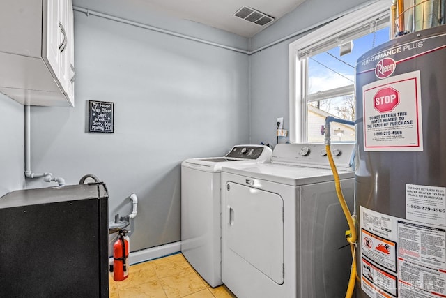 93 Ember Ln, Willingboro, NJ 08046 - laundry area featuring water heater, washing machine and dryer, and cabinet space