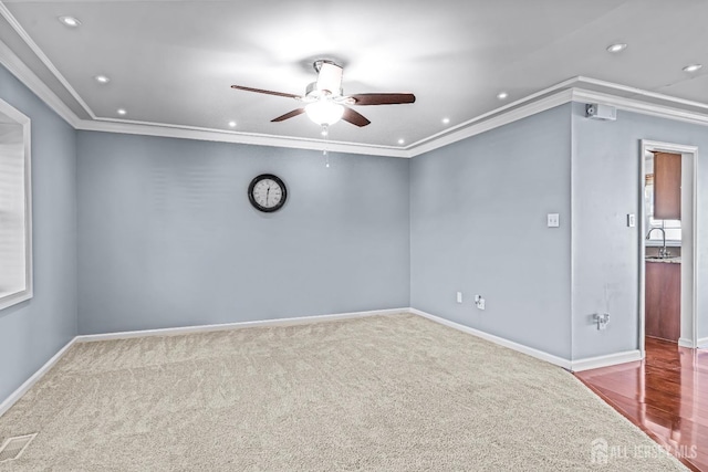 93 Ember Ln, Willingboro, NJ 08046 - carpeted spare room featuring a ceiling fan, recessed lighting, a sink, crown molding, and baseboards