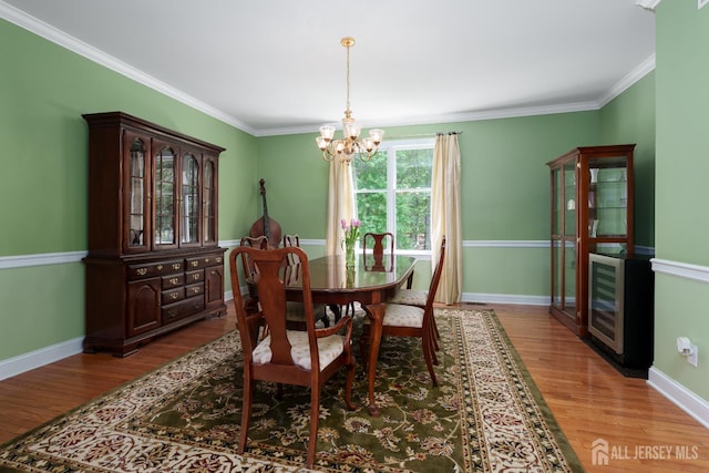3 Wheatsheaf Ct, Plainsboro, NJ 08536 - dining area with a chandelier, wood finished floors, heating unit, and ornamental molding