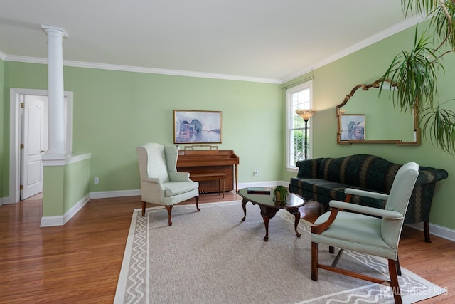 3 Wheatsheaf Ct, Plainsboro, NJ 08536 - living room with ornate columns, ornamental molding, and wood finished floors