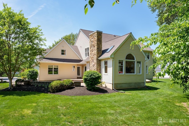 3 Wheatsheaf Ct, Plainsboro, NJ 08536 - view of front of home with a front yard, a chimney, and roof with shingles