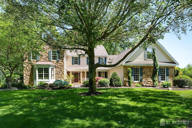 3 Wheatsheaf Ct, Plainsboro, NJ 08536 - traditional-style house with stone siding and a front yard
