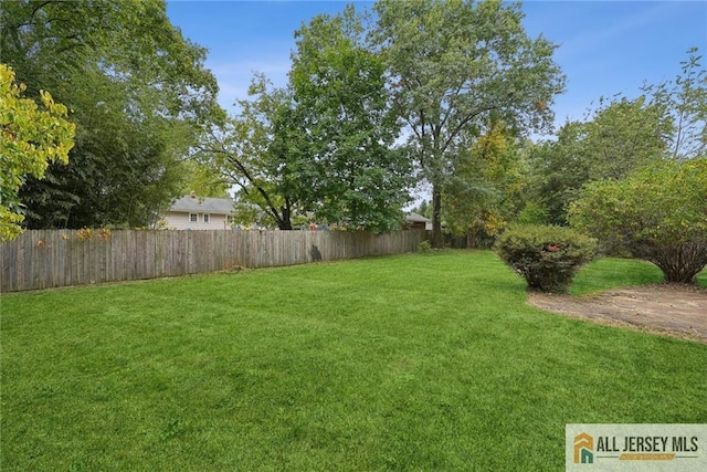 view of yard with fence