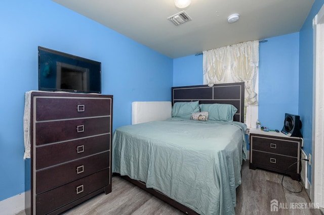 109 Washington St, Perth Amboy, NJ 08861 - bedroom featuring wood finished floors