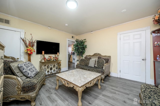 109 Washington St, Perth Amboy, NJ 08861 - living room with wood finished floors, crown molding, and baseboards