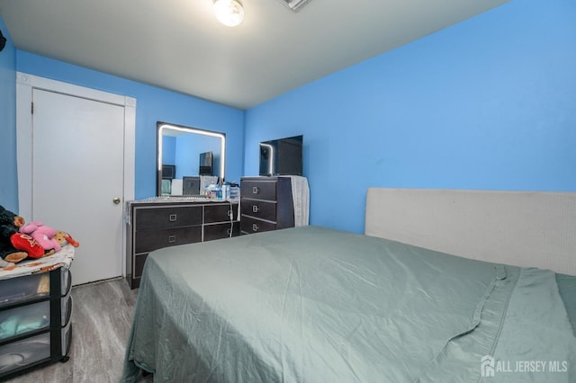 109 Washington St, Perth Amboy, NJ 08861 - bedroom featuring wood finished floors