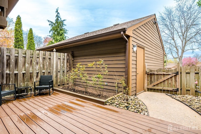 142 Maplewood Ct, Edison, NJ 08820 - wooden deck with a gate and fence