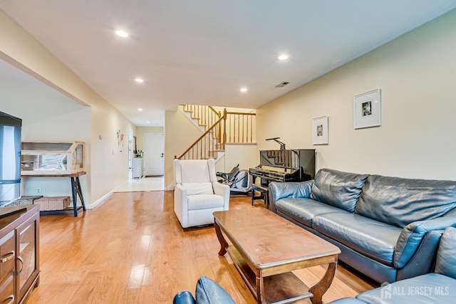 142 Maplewood Ct, Edison, NJ 08820 - living room with light wood-style floors, stairway, and recessed lighting