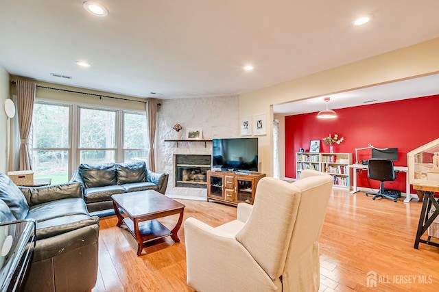 142 Maplewood Ct, Edison, NJ 08820 - living area featuring light wood-type flooring, recessed lighting, and a fireplace