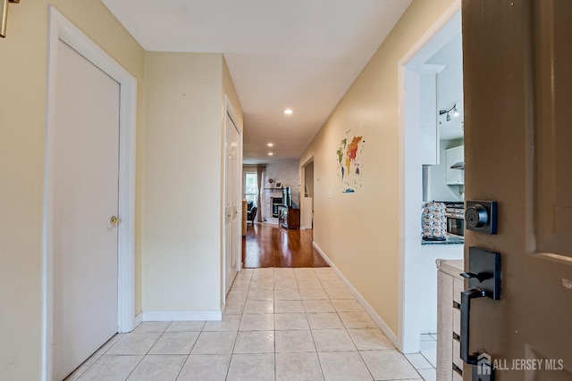 142 Maplewood Ct, Edison, NJ 08820 - hallway with light tile patterned floors, recessed lighting, and baseboards