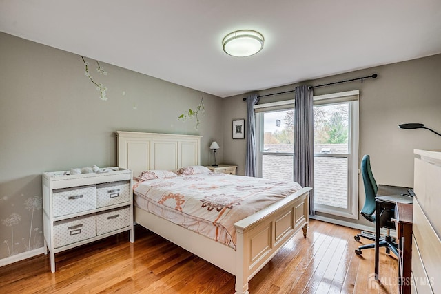 142 Maplewood Ct, Edison, NJ 08820 - bedroom with light wood-type flooring, an office area, and baseboards