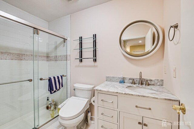 142 Maplewood Ct, Edison, NJ 08820 - full bathroom with a shower stall, toilet, and vanity