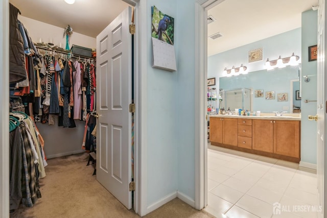 326 Sloan Ct, Matawan, NJ 07747 - walk in closet featuring light carpet