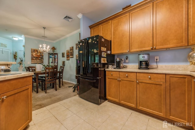 326 Sloan Ct, Matawan, NJ 07747 - kitchen with freestanding refrigerator, light carpet, brown cabinets, light countertops, and ornamental molding
