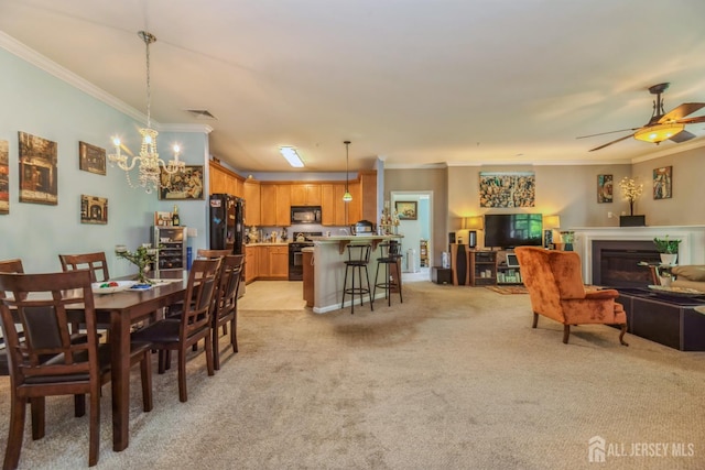 326 Sloan Ct, Matawan, NJ 07747 - dining area featuring crown molding, light carpet, ceiling fan, a fireplace, and a chandelier