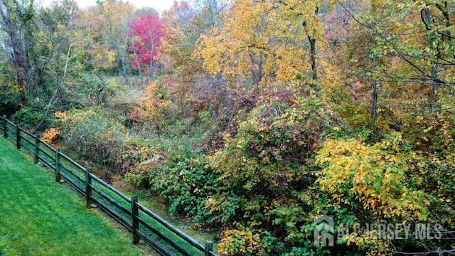 326 Sloan Ct, Matawan, NJ 07747 - view of yard featuring a forest view
