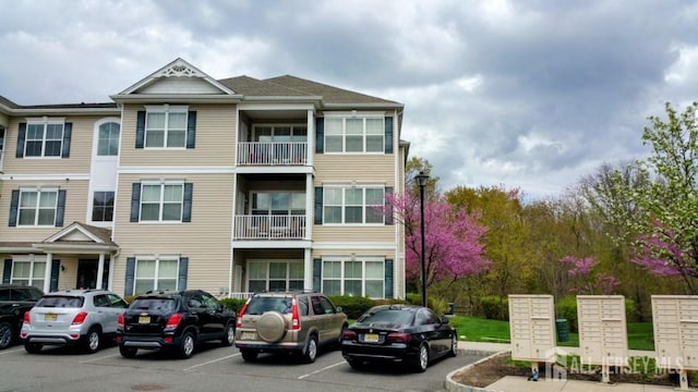 326 Sloan Ct, Matawan, NJ 07747 - view of building exterior with uncovered parking