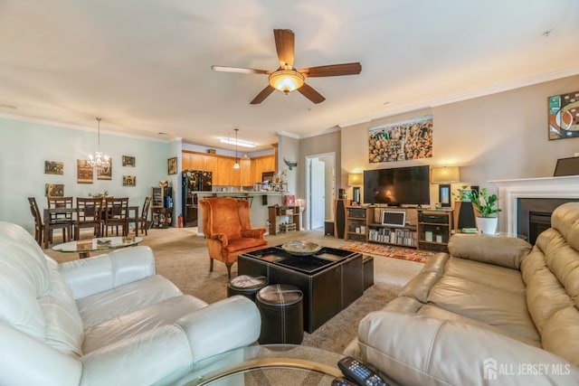 326 Sloan Ct, Matawan, NJ 07747 - living room featuring crown molding, ceiling fan, light colored carpet, a chandelier, and a fireplace