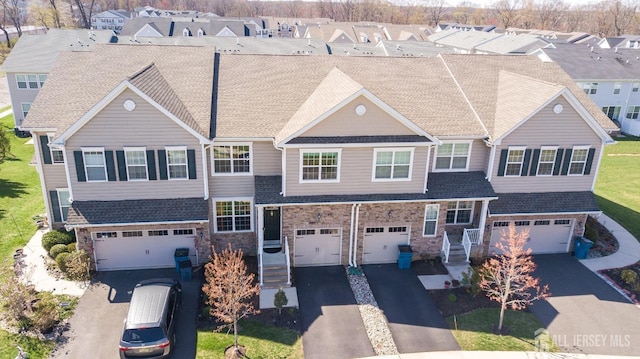 4 Woodrose Ln, Monroe, NJ 08831 - view of front of home with a residential view, stone siding, and a shingled roof