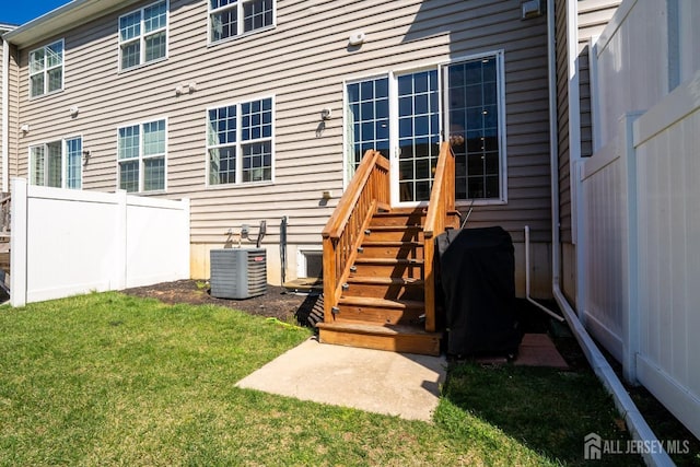 4 Woodrose Ln, Monroe, NJ 08831 - exterior space featuring a lawn, central AC unit, and fence