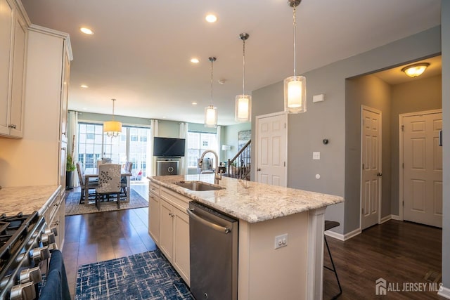 4 Woodrose Ln, Monroe, NJ 08831 - kitchen with a kitchen island with sink, a sink, dark wood-type flooring, and appliances with stainless steel finishes