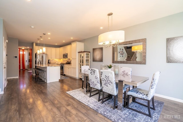 4 Woodrose Ln, Monroe, NJ 08831 - dining area featuring dark wood-type flooring, an inviting chandelier, baseboards, and recessed lighting