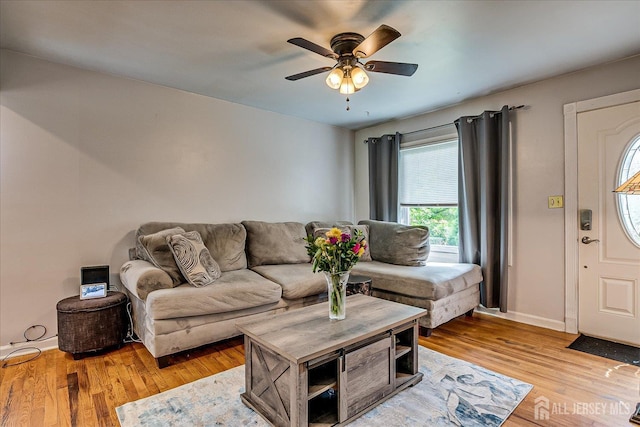6 Dundar Rd, Edison, NJ 08817 - living area with light wood-style floors and a ceiling fan
