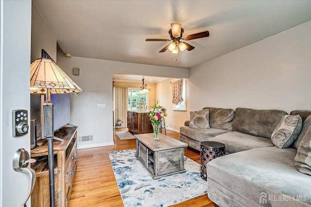 6 Dundar Rd, Edison, NJ 08817 - living room featuring ceiling fan and light wood finished floors