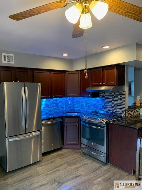47 Judson St Unit 14B, Edison, NJ 08837 - kitchen with stainless steel appliances, a ceiling fan, tasteful backsplash, light wood-style flooring, and recessed lighting
