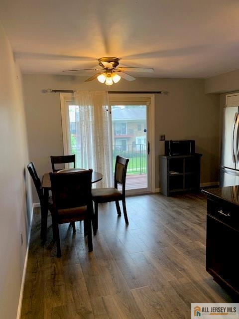 47 Judson St Unit 14B, Edison, NJ 08837 - dining space with ceiling fan and wood finished floors